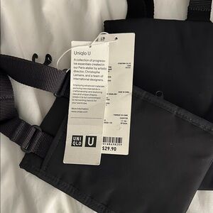 Uniqlo Men or women . Black or grey. Comes with shoulder strap.  Belt Bag